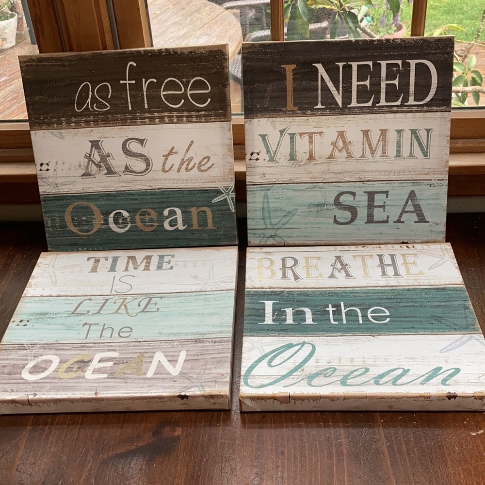 4 wall decor signs.